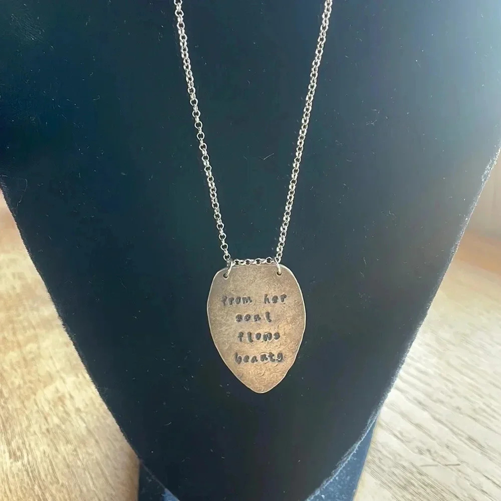 From her soul flows beauty necklace